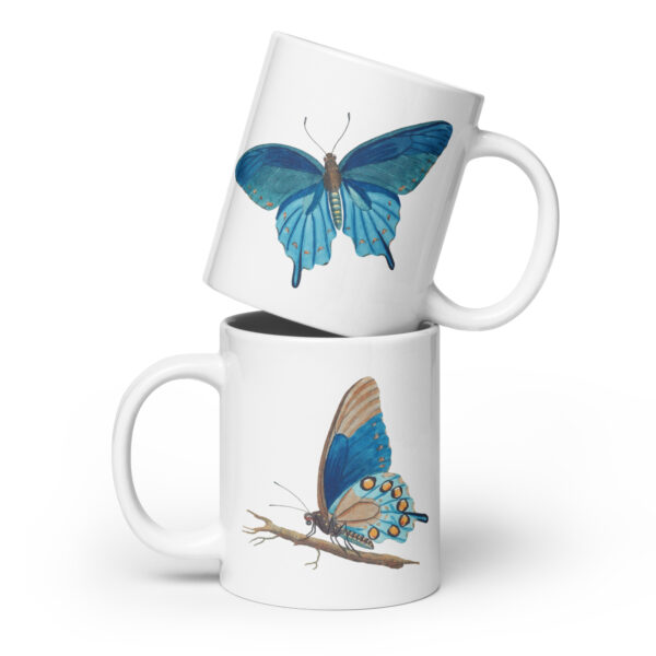 Vintage blue butterfly design mug